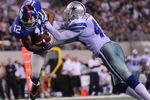 ARLINGTON, TX - SEPTEMBER 20:  Wide receiver Steve Smith #12 of the New York Giants dives for a touchdown against Gerald Sensabaugh #43 of the Dallas Cowboys at Cowboys Stadium on September 20, 2009 in Arlington, Texas.  (Photo by Ronald Martinez/Getty Images)