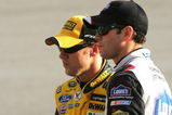 RICHMOND, VA - SEPTEMBER 11:  (R-L) Jimmie Johnson, driver of the #48 Lowe's Chevrolet, stands on pit road with Matt Kenseth, driver of the #17 Dewalt Ford, during qualifying for the NASCAR Sprint Cup Series Chevy Rock & Roll 400 at Richmond International Raceway on September 11, 2009 in Richmond, Virginia.  (Photo by Jerry Markland/Getty Images for NASCAR)