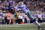 ARLINGTON, TX - SEPTEMBER 20:  Wide receiver Steve Smith #12 of the New York Giants dives for a touchdown against Gerald Sensabaugh #43 of the Dallas Cowboys at Cowboys Stadium on September 20, 2009 in Arlington, Texas.  (Photo by Ronald Martinez/Getty Images)