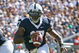 STATE COLLEGE, PA - SEPTEMBER 19: Quarterback Daryll Clark #17 of the Penn State Nittany Lions scrambles out of the pocket during a game against the Temple Owls on September 19, 2009 at Beaver Stadium in State College, Pennsylvania. (Photo by Hunter Martin/Getty Images)