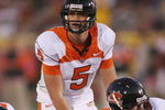 LOS ANGELES - NOVEMBER 3:  Sean Canfield #5 of the Oregon State Beavers stands under center Kyle DeVan #75 during the college football game against the USC Trojans on November 3, 2007 at the Los Angeles Memorial Coliseum in Los Angeles, California.  USC defeated Oregon State 24-3.  (Photo by Jeff Golden/Getty Images)