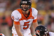 LOS ANGELES - NOVEMBER 3:  Sean Canfield #5 of the Oregon State Beavers stands under center Kyle DeVan #75 during the college football game against the USC Trojans on November 3, 2007 at the Los Angeles Memorial Coliseum in Los Angeles, California.  USC defeated Oregon State 24-3.  (Photo by Jeff Golden/Getty Images)