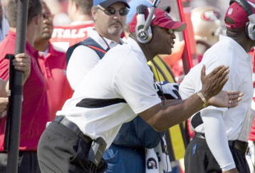 SAN FRANCISCO - SEPTEMBER 20:  Mike Singletary, head coach for the San Francisco 49ers claps his hands in approval during home opener as the San Francisco 49ers host the Seattle Seahawks at Candlestick Park September 20, 2009 in San Francisco, California. (Photo by David Paul Morris/Getty Images)