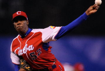 MEXICO CITY - MARCH 10:  Aroldis Chapman #52 of Cuba pitches against Australia during the first inning of the game during the 2009 World Baseball Classic Pool B match on March 10, 2009 at the Estadio Foro Sol in Mexico City, Mexico.  (Photo by Kevork Djansezian/Getty Images)