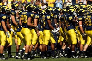 ANN ARBOR, MI - SEPTEMBER 19: Michigan Wolverines head to the locker room for halftime of the game with the Eastern Michigan Eagles at Michigan Stadium on September 19, 2009 in Ann Arbor, Michigan. (Photo by Stephen Dunn/Getty Images)