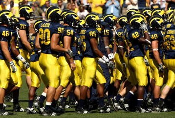 ANN ARBOR, MI - SEPTEMBER 19: Michigan Wolverines head to the locker room for halftime of the game with the Eastern Michigan Eagles at Michigan Stadium on September 19, 2009 in Ann Arbor, Michigan. (Photo by Stephen Dunn/Getty Images)
