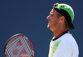 NEW YORK - SEPTEMBER 05:  Lleyton Hewitt of Australia reacts to a play during his match against Roger Federer of Switzerland during day six of the 2009 U.S. Open at the USTA Billie Jean King National Tennis Center on September 5, 2009 in the Flushing neighborhood of the Queens borough of New York City.  (Photo by Matthew Stockman/Getty Images)