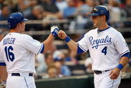 KANSAS CITY, MO - MAY 28:  Billy Butler #16 of the Kansas City Royals congratulates Alex Gordon #4 after scoring against the Minnesota Twins at Kauffman Stadium May 22, 2008 in Kansas City, Missouri. (Photo by G. Newman Lowrance/Getty Images)