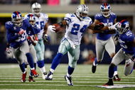 ARLINGTON, TX - SEPTEMBER 20:  Running back Marion Barber #24 of the Dallas Cowboys runs the ball past Bruce Johnson #25 of the New York Giants at Cowboys Stadium on September 20, 2009 in Arlington, Texas.  (Photo by Ronald Martinez/Getty Images)