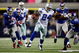 ARLINGTON, TX - SEPTEMBER 20:  Running back Marion Barber #24 of the Dallas Cowboys runs the ball past Bruce Johnson #25 of the New York Giants at Cowboys Stadium on September 20, 2009 in Arlington, Texas.  (Photo by Ronald Martinez/Getty Images)