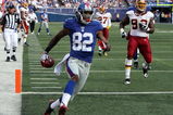EAST RUTHERFORD, NJ - SEPTEMBER 13:  Mario Manningham #82 of the New York Giants runs in a second quarter touchdown against the Washington Redskins on September 13, 2009 at Giants Stadium in East Rutherford, New Jersey.  (Photo by Jim McIsaac/Getty Images)