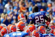 GAINESVILLE, FL - SEPTEMBER 19:  Brandon James #25 of the Florida Gators speaks to his teamates prior to the game against the Tennessee Volunteers at Ben Hill Griffin Stadium on September 19, 2009 in Gainesville, Florida.  (Photo by Sam Greenwood/Getty Images)