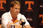 KNOXVILLE, TN - SEPTEMBER 12: Lane Kiffin, head coach of the Tennessee Volunteers talks in the press conference after a game against the UCLA Bruins on September 12, 2009 at Neyland Stadium in Knoxville, Tennessee. UCLA beat Tennessee 19-15. (Photo by Joe Murphy/Getty Images)