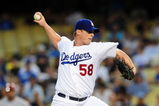 LOS ANGELES, CA - SEPTEMBER 02: Chad Billingsley #58 of the Los Angeles Dodgers pitches against the Arizona Diamondbacks on September 2, 2009 in Los Angeles, California.  (Photo by Jacob de Golish/Getty Images)