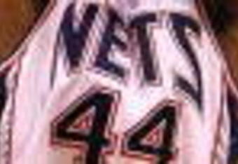EAST RUTHERFORD, NJ - FEBRUARY 10:  Trenton Hassell #44  of the New Jersey Nets shoots against against the San Antonio Spurs during their game on February 10, 2009 at The Izod Center in East Rutherford, New Jersey.  NOTE TO USER: User expressly acknowledges and agrees that, by downloading and/or using this Photograph, user is consenting to the terms and conditions of the Getty Images License Agreement.  (Photo by Al Bello/Getty Images)