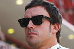 VALENCIA, SPAIN - AUGUST 22:  Fernando Alonso of Spain and Renault walks down the pitlane during the final practice session prior to qualifying for the European Formula One Grand Prix at the Valencia Street Circuit on August 22, 2009, in Valencia, Spain.  (Photo by Ryan Pierse/Getty Images)