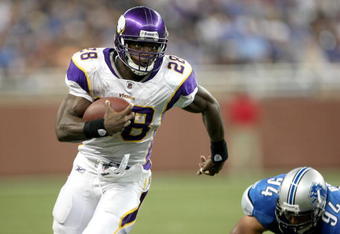 DETROIT - SEPTEMBER 20:  Running back Adrian Peterson #28 of the Minnesota Vikings carries the ball against the Detroit Lions at Ford Field on September 20, 2009 in Detroit, Michigan. The Vikings won 27-13.  (Photo by Stephen Dunn/Getty Images)