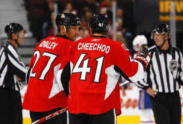 OTTAWA - SEPTEMBER 19:  Alex Kovalev #27 and Jonathan Cheechoo #41 of the Ottawa Senators discuss strategy during a preseason game against the Montreal Canadiens at Scotiabank Place on September 19, 2009 in Ottawa, Canada.  The Ottawa Senators defeated the Montreal Canadiens 6-1. (Photo by Phillip MacCallum/Getty Images)