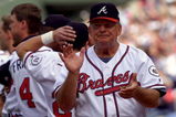 12 Oct 2001:  Bobby Cox manager of the Atlanta Braves applauds the Houston Astros prior to the game as the Braves defeated the Houston Astros 6-2 in game three of the National League Division Series at Turner Field in Atlanta, Georgia. The Braves advance to the National League Championship Series. <<<DIGITAL IMAGE>> Mandatory Credit: Doug Pensinger/ALLSPORT