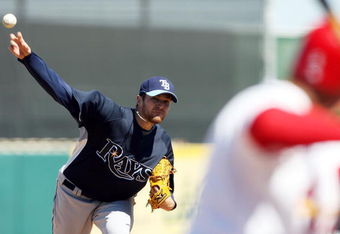 JUPITER, FL - MARCH 02:  Starting pitcher Wade Davis #58 of the Tampa Bay Rays pitches against the St. Louis Cardinals during a spring training game at Roger Dean Stadium on March 2, 2009 in Jupiter, Florida. The Rays defeated the Cardinals 8-5.  (Photo by Doug Benc/Getty Images)