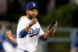 LOS ANGELES, CA - SEPTEMBER 14:  Matt Kemp #27 of the Los Angeles Dodgers gestures from the dugout against the Pittsburgh Pirates at Dodger Stadium on September 14, 2009 in Los Angeles, California.  (Photo by Jeff Gross/Getty Images)
