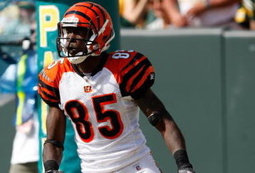 GREEN BAY, WI - SEPTEMBER 20: Wide receiver Chad Ochocinco #85 of the Cincinnati Bengals runs with the football for a touchdown after a pass reception against the Green Bay Packers at Lambeau Field on September 20, 2009 in Green Bay, Wisconsin. The Bengals defeated the Packers 31-24. (Photo by Scott Boehm/Getty Images)