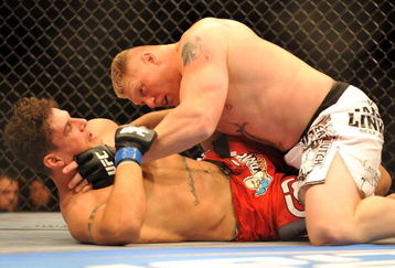 LAS VEGAS - JULY 11:  Brock Lesnar holds down Frank Mir during their heavyweight title bout during UFC 100 on July 11, 2009 in Las Vegas, Nevada.  (Photo by Jon Kopaloff/Getty Images)