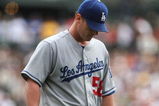 SAN FRANCISCO - SEPTEMBER 13: Chad Billingsley #58 of the Los Angeles Dodgers walks off the mound in the second inning against the San Francisco Giants during a Major League Baseball game at AT&T Park on September 13, 2009 in San Francisco, California.  (Photo by Jed Jacobsohn/Getty Images)