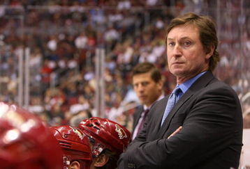 GLENDALE, AZ - FEBRUARY 28:  Head Coach Wayne Gretzky of the Phoenix Coyotes manages his team from behind the bench during his game against the St. Louis Blues on February 28, 2009 at the Jobing.com Arena in Glendale, Arizona.  (Photo by Bruce Bennett/Getty Images)
