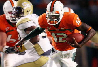 FORT LAUDERDALE, FL - SEPTEMBER 17:  Quarterback Jacory Harris #12 of the Miami Hurricanes is brought down by defensive tackle Logan Walls #96 of the Georgia Tech Yellow Jackets at Land Shark Stadium on September 17, 2009 in Fort Lauderdale, Florida. Miami defeated Georgia Tech 33-17.  (Photo by Doug Benc/Getty Images)