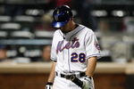 NEW YORK - SEPTEMBER 23:  Daniel Murphy #28 of the New York Mets walks to the dugout after striking out against the Atlanta Braves during the game on September 23, 2009 at Citi Field in the Flushing neighborhood of the Queens borough of New York City.  (Photo by Jared Wickerham/Getty Images)