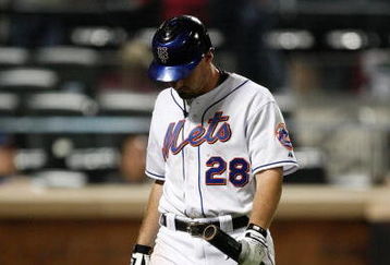 NEW YORK - SEPTEMBER 23:  Daniel Murphy #28 of the New York Mets walks to the dugout after striking out against the Atlanta Braves during the game on September 23, 2009 at Citi Field in the Flushing neighborhood of the Queens borough of New York City.  (Photo by Jared Wickerham/Getty Images)