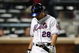 NEW YORK - SEPTEMBER 23:  Daniel Murphy #28 of the New York Mets walks to the dugout after striking out against the Atlanta Braves during the game on September 23, 2009 at Citi Field in the Flushing neighborhood of the Queens borough of New York City.  (Photo by Jared Wickerham/Getty Images)