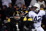 IOWA CITY, IOWA - NOVEMBER 8: Kicker Daniel Murray #1 of the Iowa Hawkeyes celebrates with teammate Ryan Donahue #5 after kicking the game winning field goal defeating Penn State Nittany Lions with six seconds left on the clock at Kinnick Stadium on November 8, 2008 in Iowa City, Iowa. Iowa defeated Penn State  24-23. (Photo by David Purdy/Getty Images)