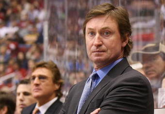 GLENDALE, AZ - FEBRUARY 28:  (FILE PHOTO) Head Coach Wayne Gretzky of the Phoenix Coyotes manages his team from behind the bench during his game against the St. Louis Blues on February 28, 2009 at the Jobing.com Arena in Glendale, Arizona. Gretzky announced on his website he resigned as the coach for the Phoenix Coyotes on September 24, 2009 in Glendale, Arizona. (Photo by Bruce Bennett/Getty Images)