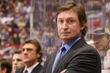 GLENDALE, AZ - FEBRUARY 28:  (FILE PHOTO) Head Coach Wayne Gretzky of the Phoenix Coyotes manages his team from behind the bench during his game against the St. Louis Blues on February 28, 2009 at the Jobing.com Arena in Glendale, Arizona. Gretzky announced on his website he resigned as the coach for the Phoenix Coyotes on September 24, 2009 in Glendale, Arizona. (Photo by Bruce Bennett/Getty Images)