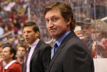 GLENDALE, AZ - FEBRUARY 28:  Head Coach Wayne Gretzky of the Phoenix Coyotes manages his team from behind the bench during his game against the St. Louis Blues on February 28, 2009 at the Jobing.com Arena in Glendale, Arizona.  (Photo by Bruce Bennett/Getty Images)