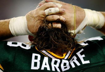 GREEN BAY, WI - AUGUST 15:  Offensive guard Allen Barbre #78 of the Green Bay Packers fixes his hair against the Cleveland Browns during the preseason game at Lambeau Field on August 15, 2009 in Green Bay, Wisconsin. (Photo by Jonathan Daniel/Getty Images)