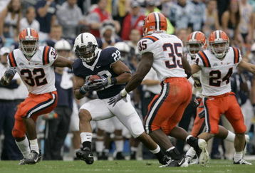 STATE COLLEGE, PA - SEPTEMBER 12: Tail back Evan Royster #22 of the Penn State Nittany Lions rushes through linebacker Doug Hogue #32 and safety Mike Holmes #35 of the Syracuse Orangemen during the first half at Beaver Stadium  September 12, 2009 in State College, Pennsylvania. (Photo by Chris Gardner/Getty Images)