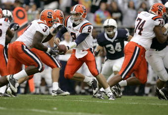 STATE COLLEGE, PA - SEPTEMBER 12: Quarterback Greg Paulus #2 of the Syracuse Orangemen hands off to running back Delone Carter #3 during the first half against the Penn State Nittany Lions at Beaver Stadium  September 12, 2009 in State College, Pennsylvania. (Photo by Chris Gardner/Getty Images)