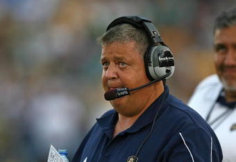 SOUTH BEND, IN - SEPTEMBER 19: Head coach Charlie Weis of the Notre Dame Fighting Irish watches as his team takes on the Michigan State Spartans on September 19, 2009 at Notre Dame Stadium in South Bend, Indiana. Notre Dame defeated Michigan State 33-30. (Photo by Jonathan Daniel/Getty Images)