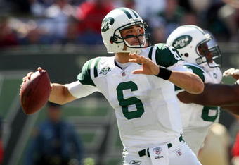 EAST RUTHERFORD, NJ - SEPTEMBER 20:  Mark Sanchez #6 of the New York Jets throws a pass against the New England Patriots at Giants Stadium on September 20, 2009 in East Rutherford, New Jersey.  (Photo by Nick Laham/Getty Images)
