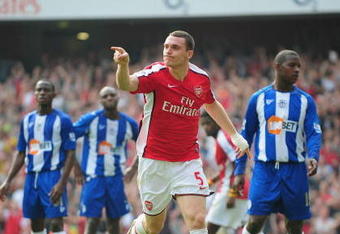 LONDON, ENGLAND - SEPTEMBER 19:  Thomas Vermaelen of Arsenal celebrates his goal during the Barclays Premier League match between Arsenal and Wigan Athletic at the Emirates Stadium on September 19, 2009 in London, England.  (Photo by Clive Mason/Getty Images)