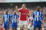 LONDON, ENGLAND - SEPTEMBER 19:  Thomas Vermaelen of Arsenal celebrates his goal during the Barclays Premier League match between Arsenal and Wigan Athletic at the Emirates Stadium on September 19, 2009 in London, England.  (Photo by Clive Mason/Getty Images)