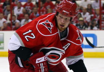 RALEIGH, NC - MAY 26:  Eric Staal #12 of the Carolina Hurricanes skates against the Pittsburgh Penguins during Game Four of the Eastern Conference Championship Round of the 2009 Stanley Cup Playoffs at RBC Center on May 26, 2009 in Raleigh, North Carolina. Pittsburgh won the game 4-1 to complete a four game sweep.  (Photo by Jim McIsaac/Getty Images)