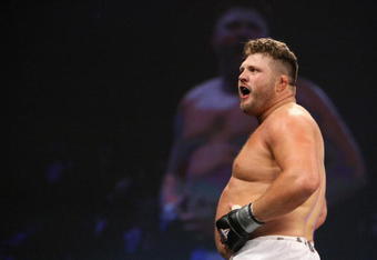 UNCASVILLE, CT - MAY 16: Roy Nelson (White Trunks) of the Lions Den celebrates after beating Brad Imes MilesTech Fighting System during their bout presented by the International Fighting League at the Mohegan Sun Arena May 16, 2008 in Uncasville, Connecticut.  (Photo by Al Bello/Getty Images)