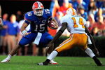 GAINESVILLE, FL - SEPTEMBER 19:  Tim Tebow #15 of the Florida Gators is cornered by Eric Berry #14 of the Tennessee Volunteers during the game at Ben Hill Griffin Stadium on September 19, 2009 in Gainesville, Florida.  (Photo by Sam Greenwood/Getty Images)