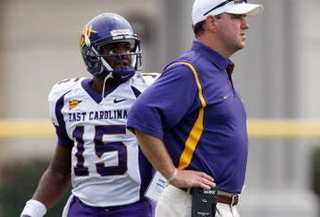 CHAPEL HILL, NC - SEPTEMBER 19:  Head coach Skip Holtz of the East Carolina Pirates watches on with his quarterback Patrick Pinkney #15 against the North Carolina Tar Heels at Kenan Stadium on September 19, 2009 in Chapel Hill, North Carolina.  (Photo by Streeter Lecka/Getty Images)