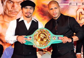 BEVERLY HILLS, CA - SEPTEMBER 14:  Manny Pacquiao and  Miguel Cotto pose for pictures during the press conference at the Beverly Hills Hotel on September 14, 2009 in Beverly Hills, California.  (Photo by Jacob de Golish/Getty Images)