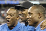 Detroit Lions running backs Billy Simms and Barry Sanders flank Lem Barney before play against  the Indianapolis Colts in a Thanksgiving Day game, November 25, 2005 in Detroit.  The Colts defeated the Lions 41 to 9.  (Photo by Al Messerschmidt/Getty Images)